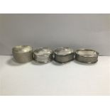 A GROUP OF FOUR SILVER NAPKIN RINGS, EACH WITH ENGINE TURNED DECORATION, 54G