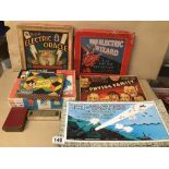 A COLLECTION OF VINTAGE GAMES INCLUDING THE ELECTRIC WIZARD AND TRI-TACTICS