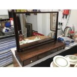 A REGENCY FLAME MAHOGANY DRESSING MIRROR WITH THREE DRAWERS WITH IVORY HANDLES