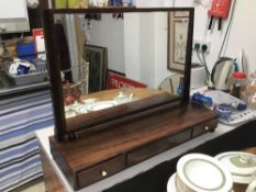 A REGENCY FLAME MAHOGANY DRESSING MIRROR WITH THREE DRAWERS WITH IVORY HANDLES