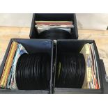 A QUANTITY OF VINYL SINGLES, INCLUDING FOUR CASES