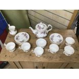 A ROYAL ALBERT LAVENDER ROSE TWENTY-ONE PIECE TEA SET