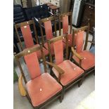 A SET OF SIX GOLD BUTTON ERCOL DINING CHAIRS