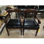 A PAIR OF BLACK LEATHER WILLIAM IV ARMCHAIRS IN MAHOGANY