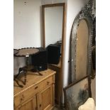 A LARGE PINE FRAMED MIRROR 210 X 52CMS