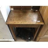 A VINTAGE SCHOOL DESK WITH INKWELL AND STORAGE