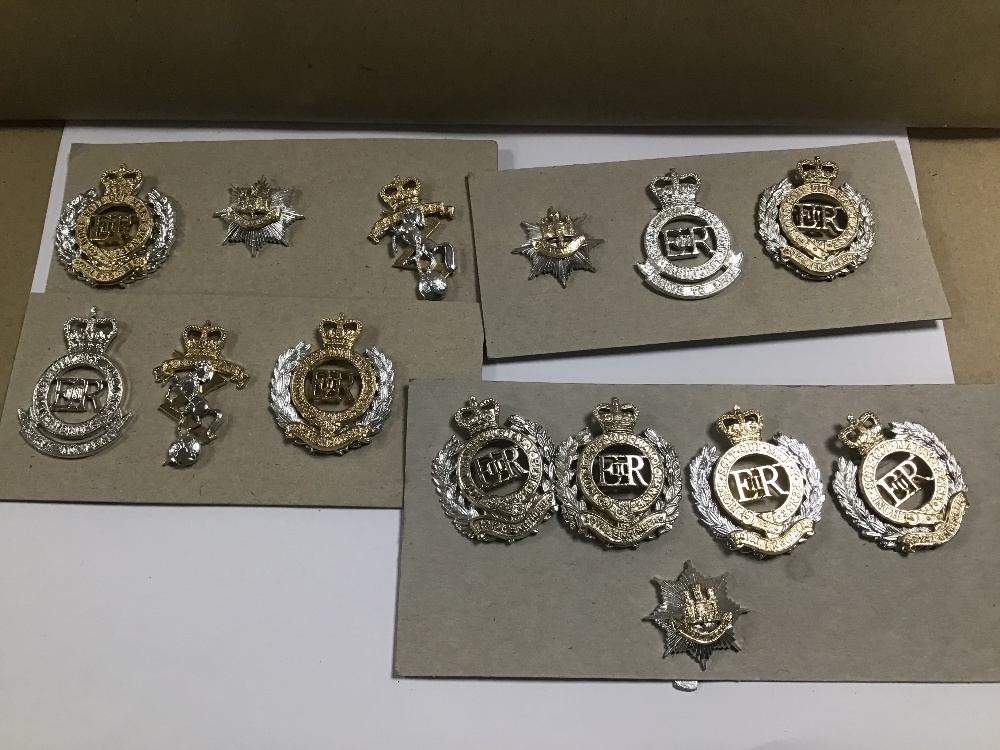 A COLLECTION OF ASSORTED MILITARY CAP BADGES FROM VARIOUS REGIMENTS WITH NAPKIN RINGS - Image 3 of 5