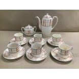 A MID CENTURY TEA SET BY SUVESCO, COMPRISING TEA POT, CUPS AND SAUCERS