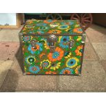 A VINTAGE METAL BOUND TRUNK