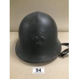 A MILITARY HELMET WITH ITS INNERS