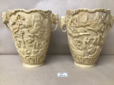 A PAIR OF MODERN RESIN TWO HANDLED VASES DEPICTING TRADITIONAL CHINESE SCENES, 26CM HIGH