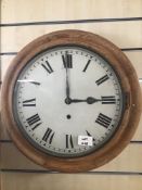 A VINTAGE PINE SURROUND WALL CLOCK