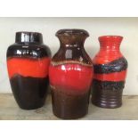 A GROUP OF THREE WEST GERMAN LAVA POTTERY VASES, LARGEST 21CM HIGH