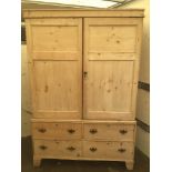 A LARGE VICTORIAN PINE DOUBLE WARDROBE WITH FOUR BOTTOM DRAWERS COMES INTO TWO PIECES 205 X 137 X