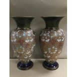 A PAIR OF LATE 19TH/EARLY 20TH CENTURY ROYAL DOULTON SLATERS PATENT STONEWARE VASES, ARTISTS MARK TO