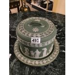 A VICTORIAN WEDGEWOOD GREEN JASPERWARE CHEESE DISH AND COVER DECORATED IN CLASSICAL FIGURES