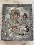 AN EARLY RUSSIAN ORTHODOX HAND PAINTED ICON DEPICTING MOTHER MARY AND JESUS, RUSSIAN WORDING