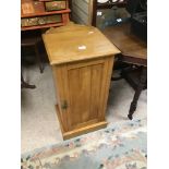 A VINTAGE OAK POT CUPBOARD