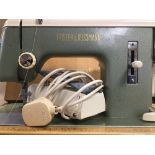 A LARGE FRISTER & ROSTMAN SEWING MACHINE, IN ORIGINAL CASE