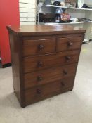 A MAHOGANY VICTORIAN TWO OVER THREE CHEST OF DRAWERS