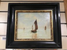 AN EBONISED FRAMED OIL ON BOARD SIGNED M.M OF FISHING BOATS AT SEA 37 X 32CMS