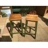 A PAIR OF VINTAGE STOOLS LEGS PAINTED GREEN