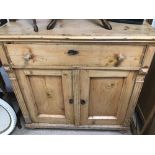 A VICTORIAN CUPBOARD WITH DRAWER