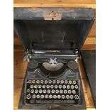 A 1930S PORTABLE GERMAN CONTINENTAL TYPEWRITER