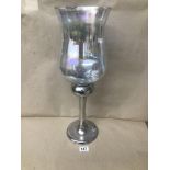 A LARGE GLASS AND METAL TEA LIGHT HOLDER, 55CMS HIGH