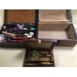 AN EARLY 20TH CENTURY OAK BOX CONTAINING VARIOUS STATIONARY, TOGETHER WITH A CASED MAGNIFYING