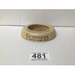 AN ASHTEAD POTTERY ASH TRAY FOR ARTHUR GUINNESS, WITH SCENE TO TOP DEPICTING SAM WELLER BY PHIZ,