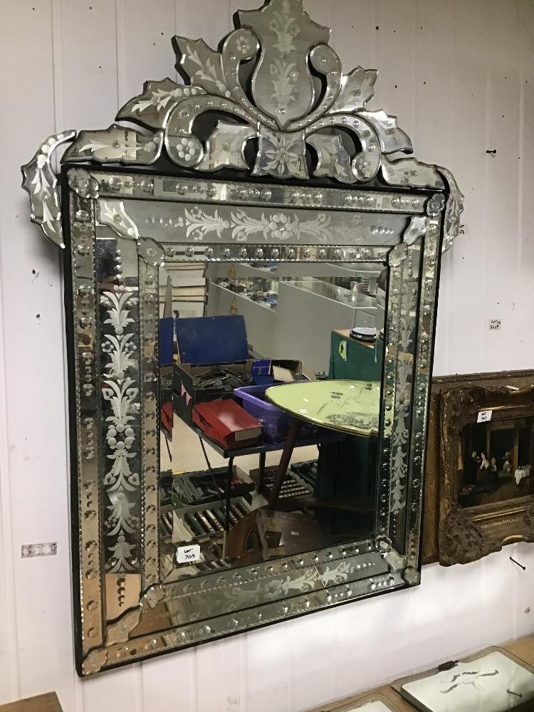 A LARGE VENITIAN MIRROR 70 X112CMS