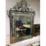 A LARGE VENITIAN MIRROR 70 X112CMS