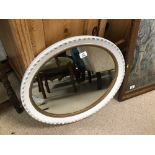 A VINTAGE PAINTED OVAL MIRROR 59CMS