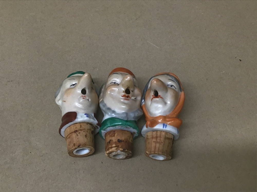 A GROUP OF THREE NOVELTY PORCELAIN WINE BOTTLE POURER STOPPERS IN THE FOR OF PEOPLE - Image 2 of 3