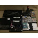 A ZX SPECTRUM WITH ACCESSORIES