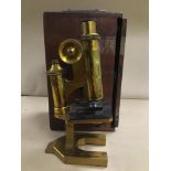 AN EARLY 20TH CENTURY BRASS MICROSCOPE BY R & J BECK LTD, LONDON, 25550, IN ORIGINAL FITTED BOX