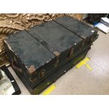 A LARGE GREEN BRASS AND WOODEN BOUND VINTAGE TRUNK