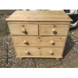 A VICTORIAN TWO OVER TWO PINE CHEST OF DRAWERS