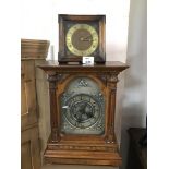 AN OAK BRACKET CLOCK WITH A SMITHS MANTLE CLOCK