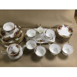 A THIRTY- FOUR PIECE ROYAL ALBERT OLD COUNTRY ROSES TEA SET, INCLUDING TEA POT, TEA CUPS, SAUCERS