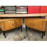 A PAIR OF RETRO BEDSIDE CABINETS WITH BLACK LEGS