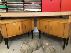 A PAIR OF RETRO BEDSIDE CABINETS WITH BLACK LEGS