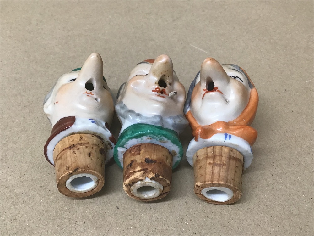 A GROUP OF THREE NOVELTY PORCELAIN WINE BOTTLE POURER STOPPERS IN THE FOR OF PEOPLE - Image 3 of 3