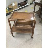 A RETRO VINTAGE TWO TIER TEA TROLLEY WITH GLASS TRAY