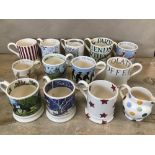 A COLLECTION OF THIRTEEN EMMA BRIDGEWATER MUGS OF VARIOUS DESIGNS, INCLUDING SNOWFLAKES, REINDEER,