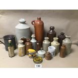 A COLLECTION OF STONEWARE BOTTLES, SOME WITH NAMES