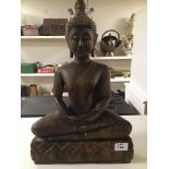 A VINTAGE WOODEN SEATED BUDDHA 50 CM