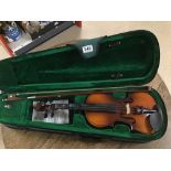 AN ANTON STUDENT VIOLIN 1/2 SIZE WITH CASE.