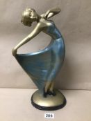 A LARGE PAINTED PLASTER FIGURE OF A DECO STYLE DANCING LADY, METALLIC LIKE GLAZE, 40CM HIGH